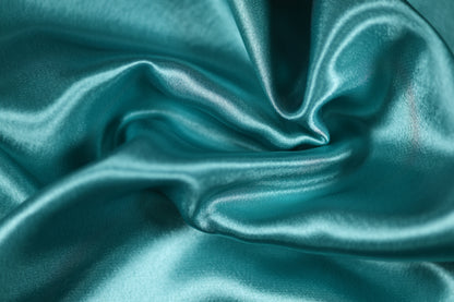 Türkis Krepp Satin Stoff mit Glanz