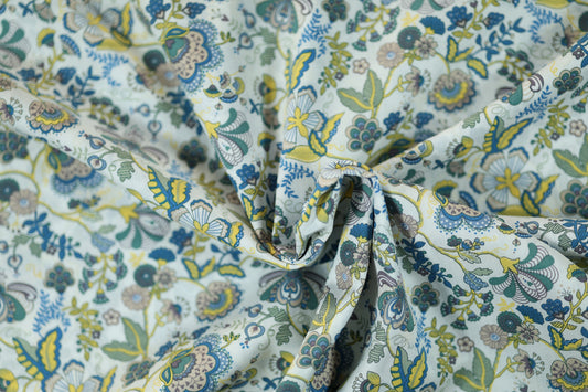 Baumwollstretch – Blumenornamente in Blau, Grün & Gelb – elastischer Baumwollstoff für kreative Projekte