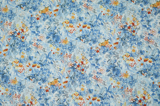Floraler Baumwoll-Stretchstoff in Himmelblau mit Orange – ideal für Bekleidung und kreative Projekte