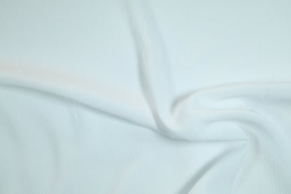 Krepp Viskose in Weiß – weich, fließend und perfekt für Kleidung.