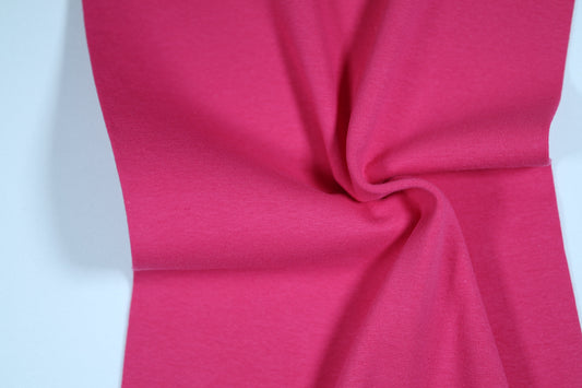 Pinkfarbener Bündchenstoff aus Baumwolle – kräftig und elastisch
