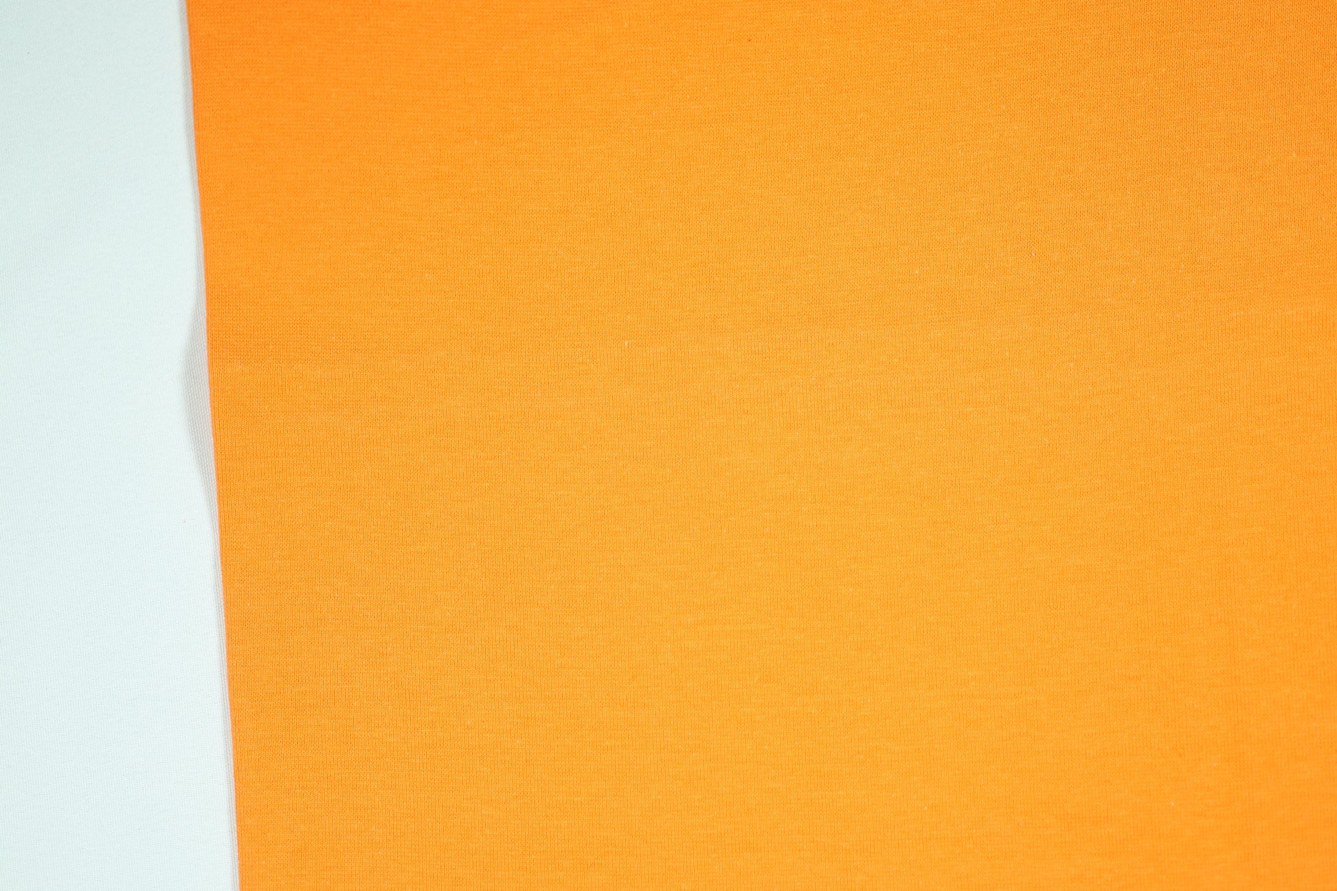Orangefarbener Bündchenstoff aus Baumwolle – elastisch und farbintensiv 34cm breit